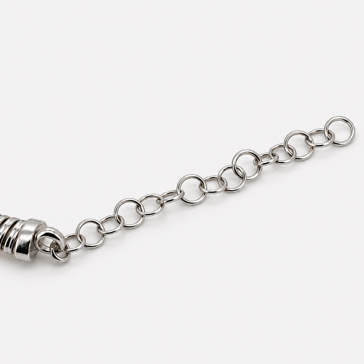 RYBARA Two-tone Spiral Bracelet — extension chain detail